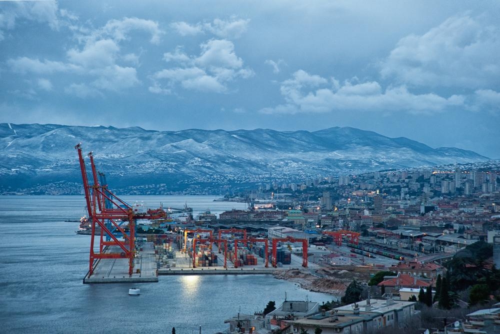 Container cranes at the Brajdica terminal in Rijeka at dusk